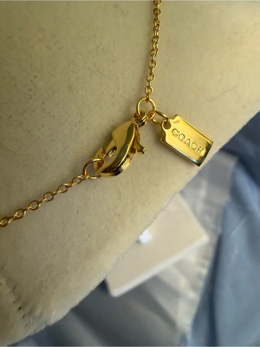 Coach Gold Bow Necklace with Multicolored Stones